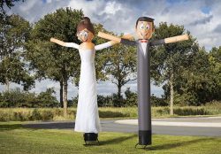 Happy Bride and Groom Sky Dancer Event Rentals